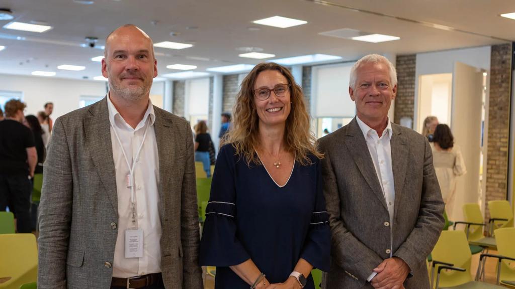nja Groth, smiling alongside the CEO of the Danish Cancer Society, Jesper Fisker, and the CEO of the Danish National Research Foundation, Niels Mejlgaard, on the official EpiC opening day. ​